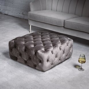 large square buttoned footstool